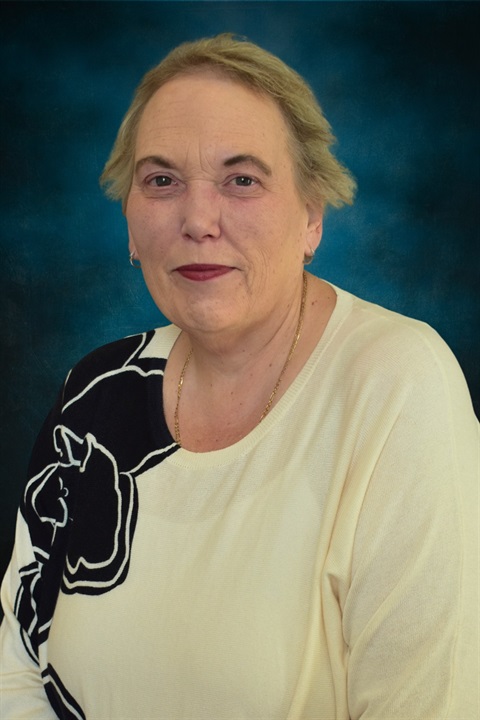 Michelle Headshot on background 2.jpg